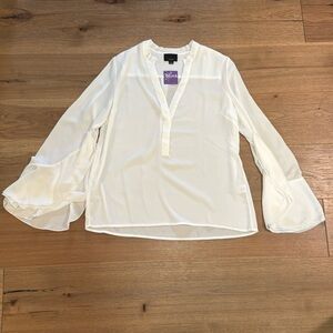 Women’s long sleeve top with ruffle sleeve detail